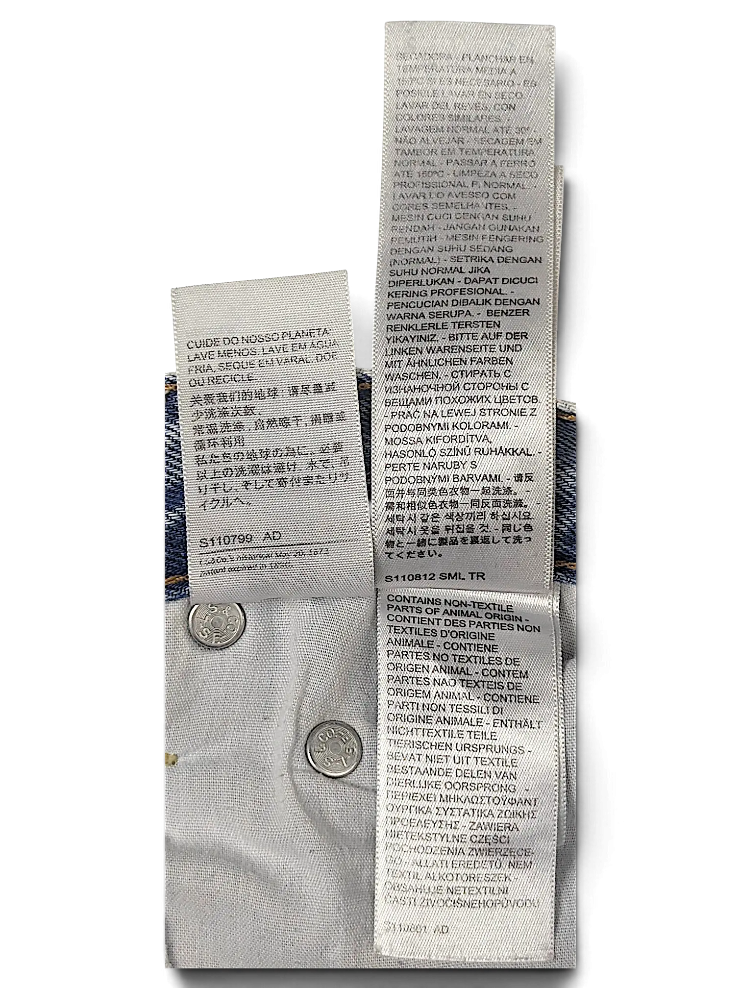 JAKE & IPI Levi's jeans interior care and material composition labels with five-pocket denim construction detail