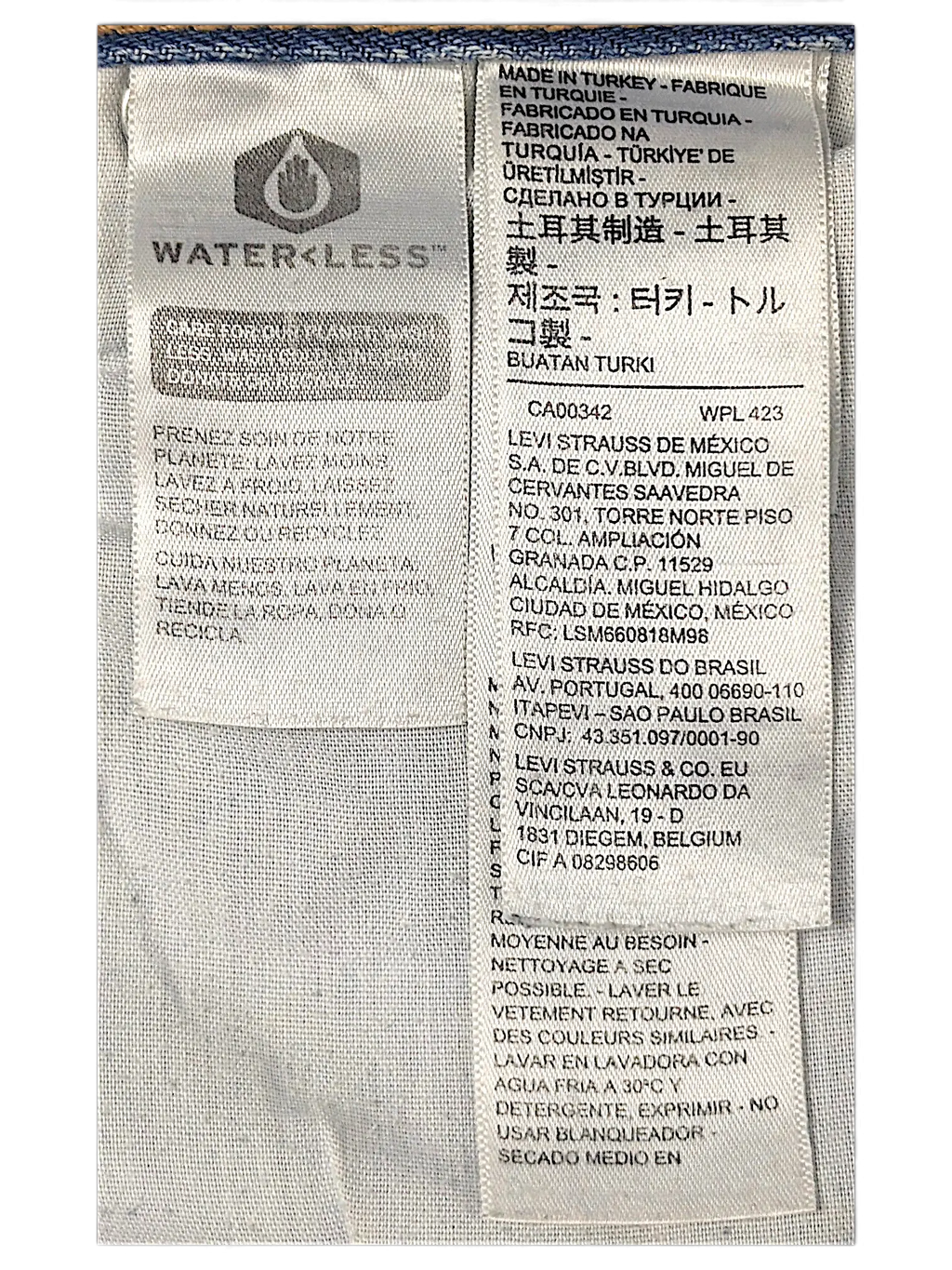 JAKE & IPI Levi's jeans interior care and origin label showing Water Less technology and manufacturing details