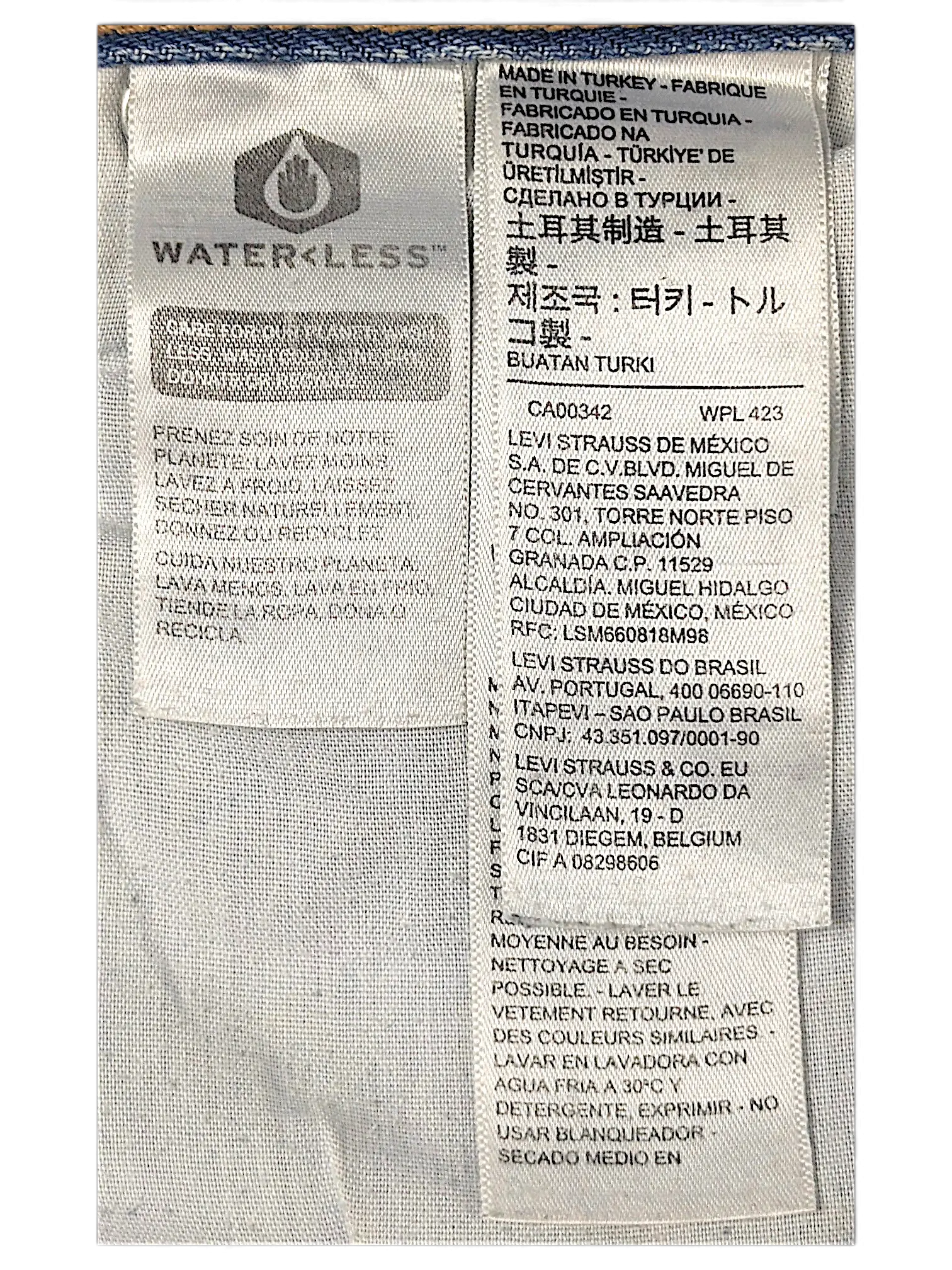 JAKE & IPI Levi's jeans interior care and origin label showing Water Less technology and manufacturing details