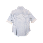 Back view of a light blue JAKE & IPI pre-owned Levi's short sleeve denim western shirt with a curved hem.