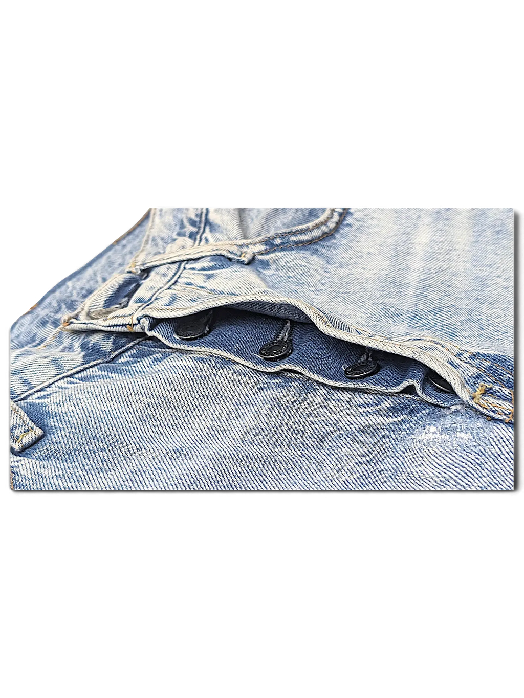 JAKE & IPI Levi's light wash denim jeans featuring a classic button fly closure and durable cotton construction.