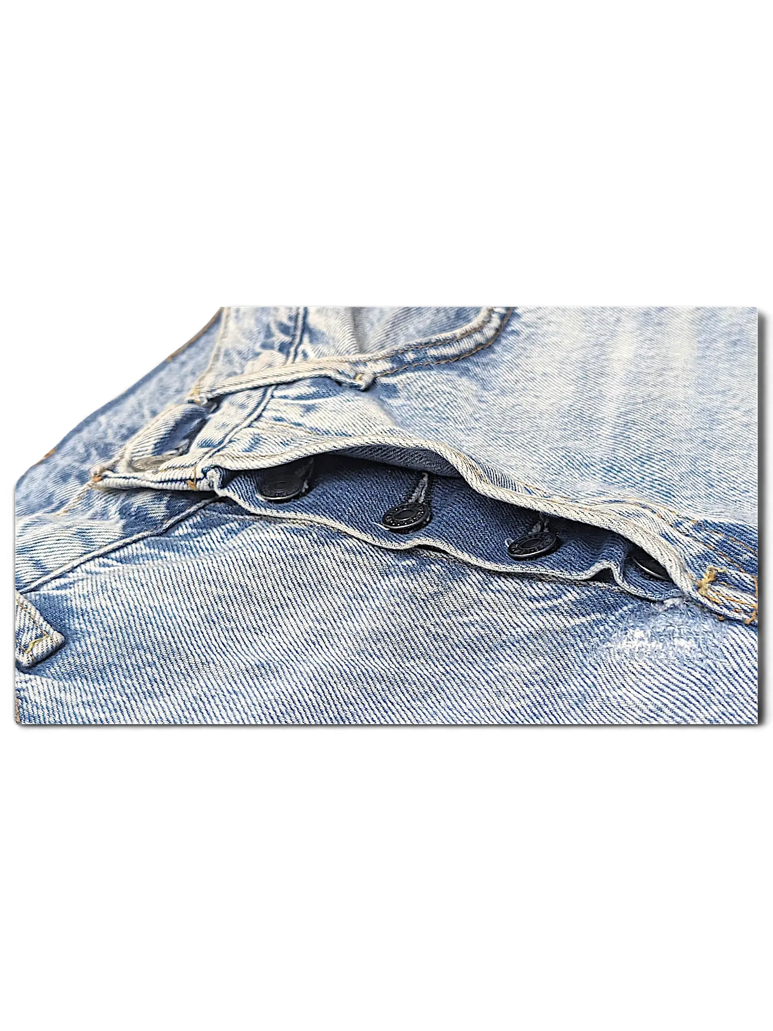 JAKE & IPI Levi's light wash denim jeans featuring a classic button fly closure and durable cotton construction.