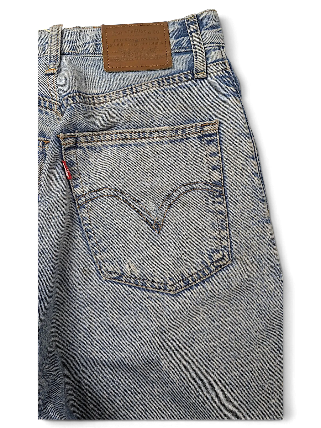JAKE & IPI Levi's light wash denim jeans featuring a classic five-pocket design and leather back patch.