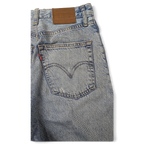 JAKE & IPI Levi's light wash denim jeans featuring a classic five-pocket design and leather back patch.