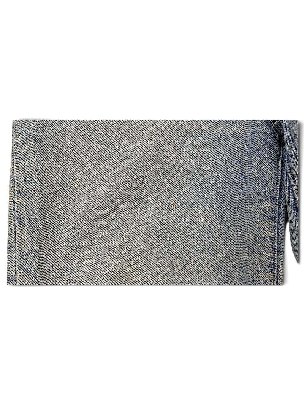JAKE & IPI Levi's light wash denim jeans showing fabric texture and a small spot detail