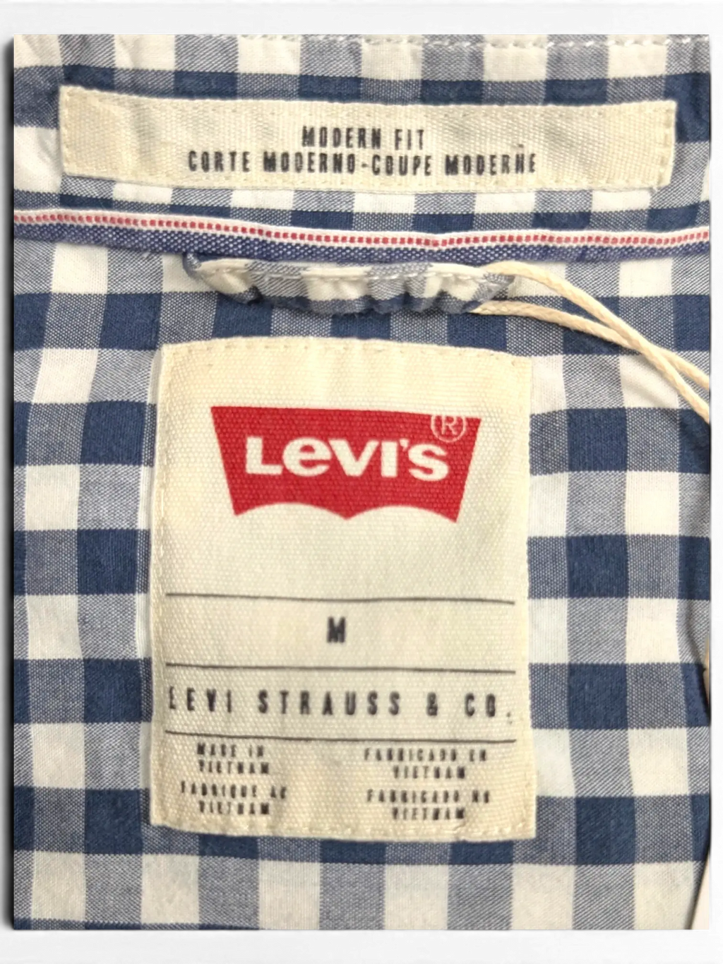 JAKE & IPI pre-owned Levi's navy and white gingham short sleeve shirt with modern fit label and snap buttons.