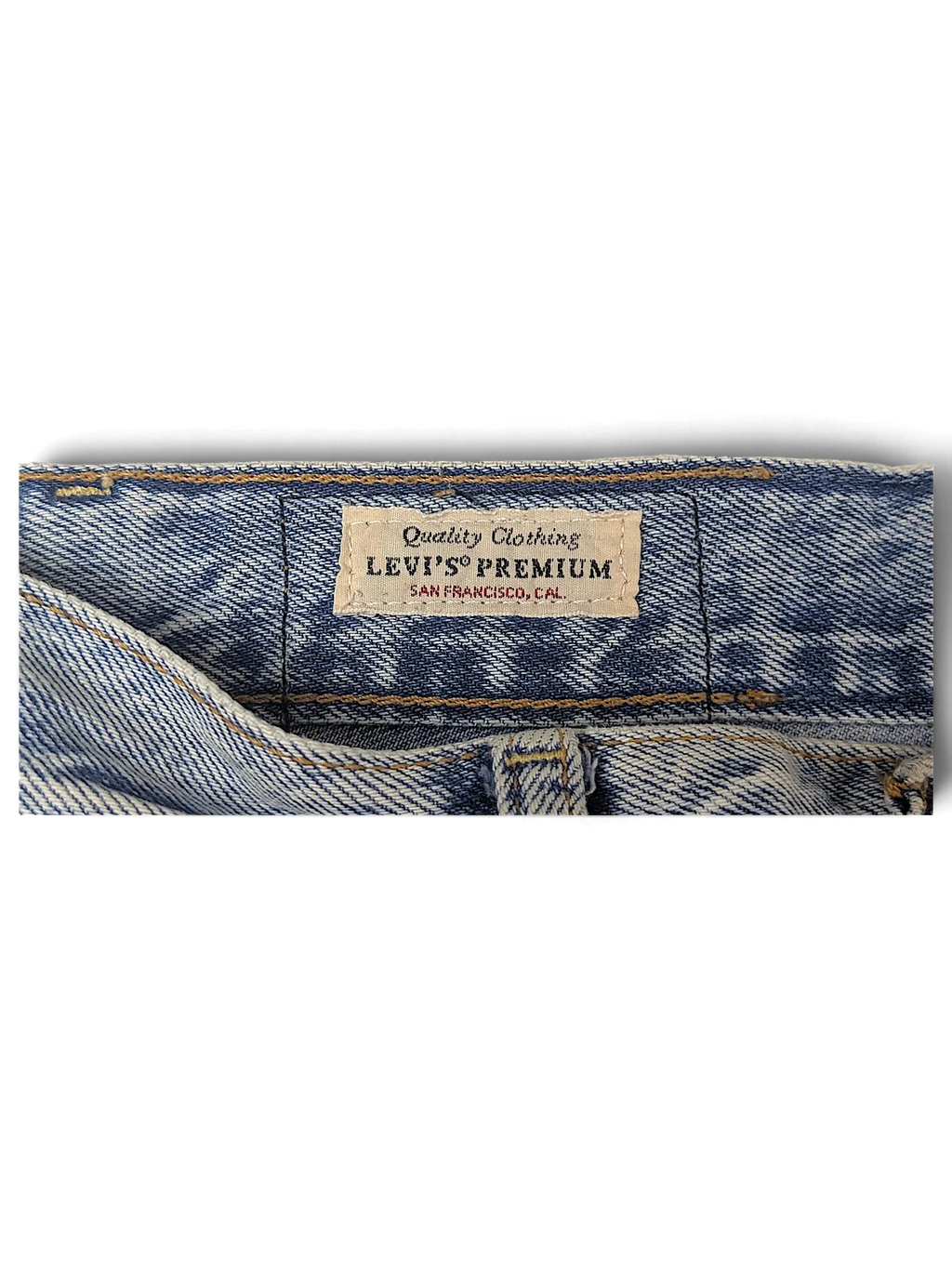 JAKE & IPI Levi's Premium denim jeans featuring a classic beige leather brand patch on the waistband