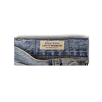 JAKE & IPI Levi's Premium denim jeans featuring a classic beige leather brand patch on the waistband