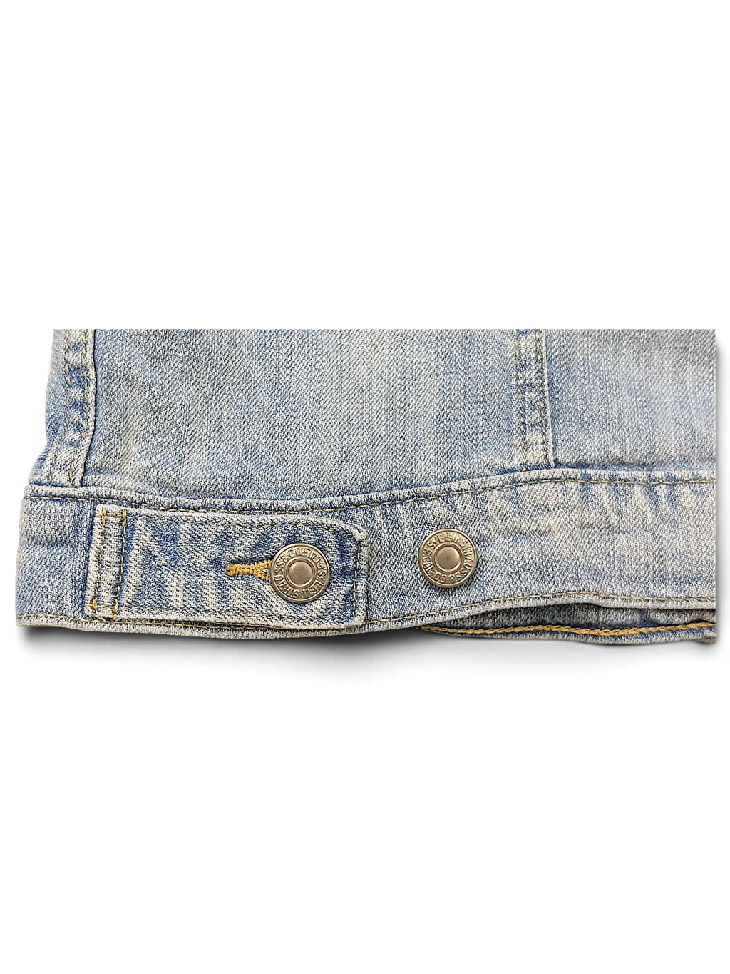 JAKE & IPI Levi's Strauss light wash denim jacket hem detail with branded metal buttons and yellow stitching.