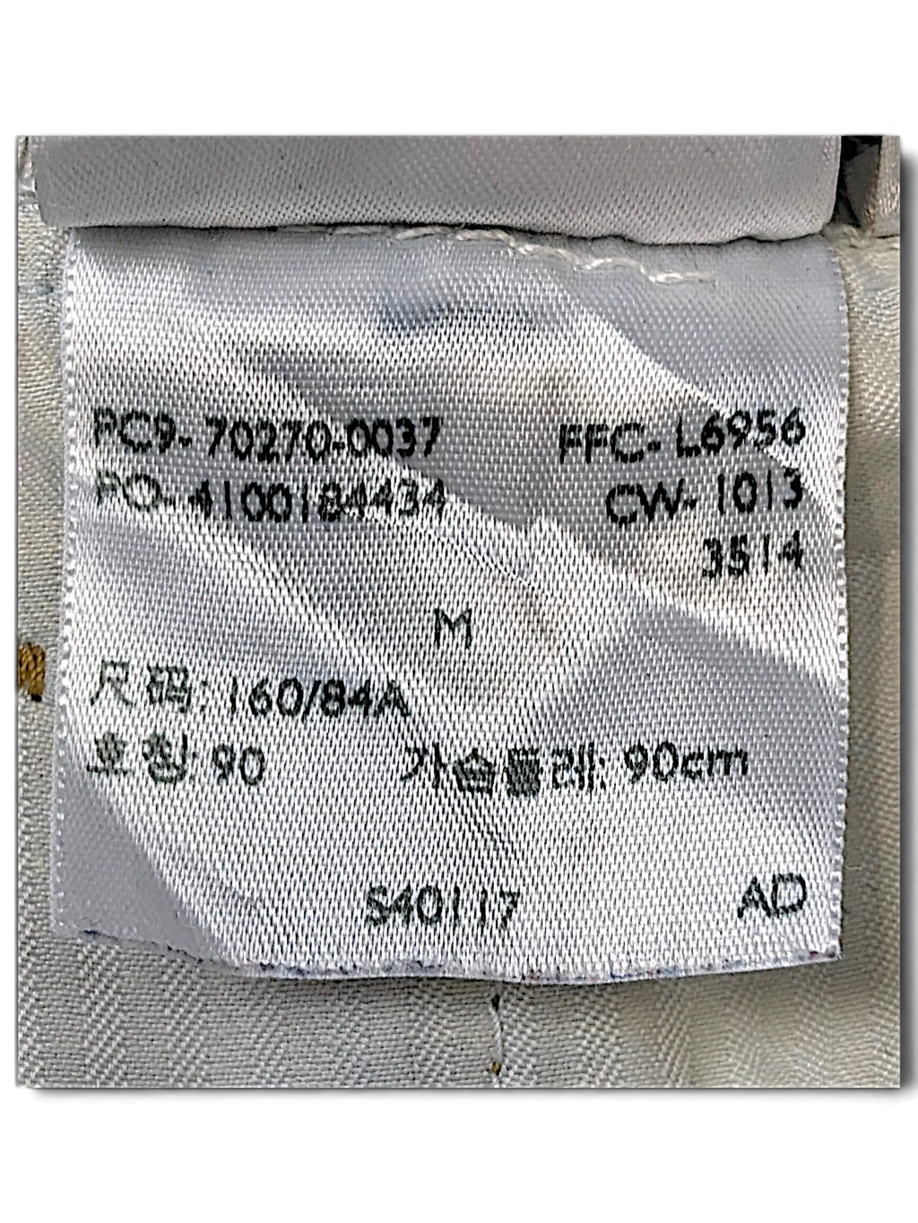 JAKE & IPI Levi's Strauss girls jacket size M clothing care label with product codes and sizing information
