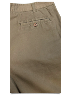 JAKE & IPI Liberty vintage olive green pleated trousers featuring a single buttoned back pocket detail.