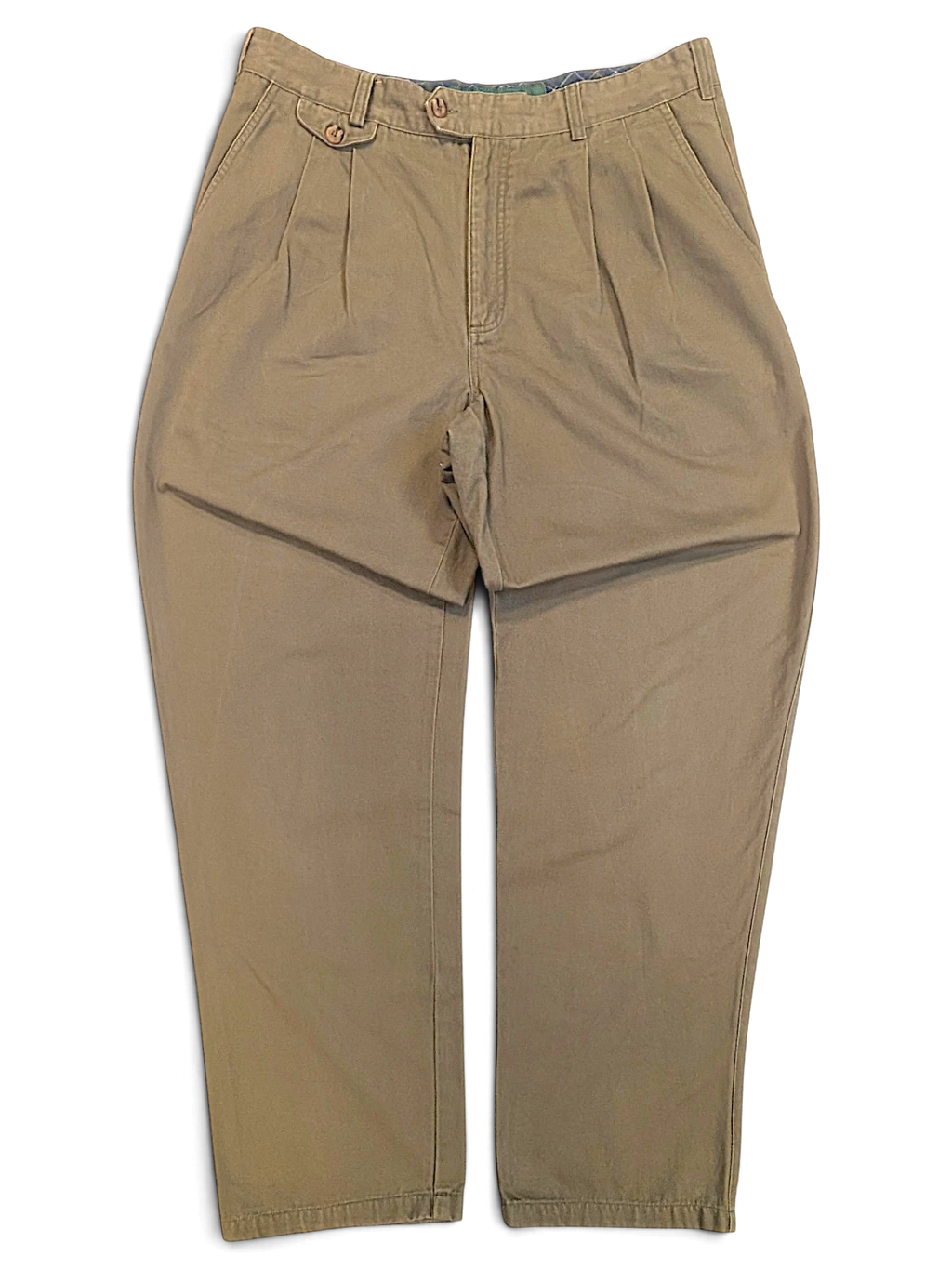 JAKE & IPI Liberty vintage olive green pleated trousers with a straight leg and button detail on the waistband.