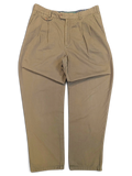 JAKE & IPI Liberty vintage olive green pleated trousers with a straight leg and button detail on the waistband.