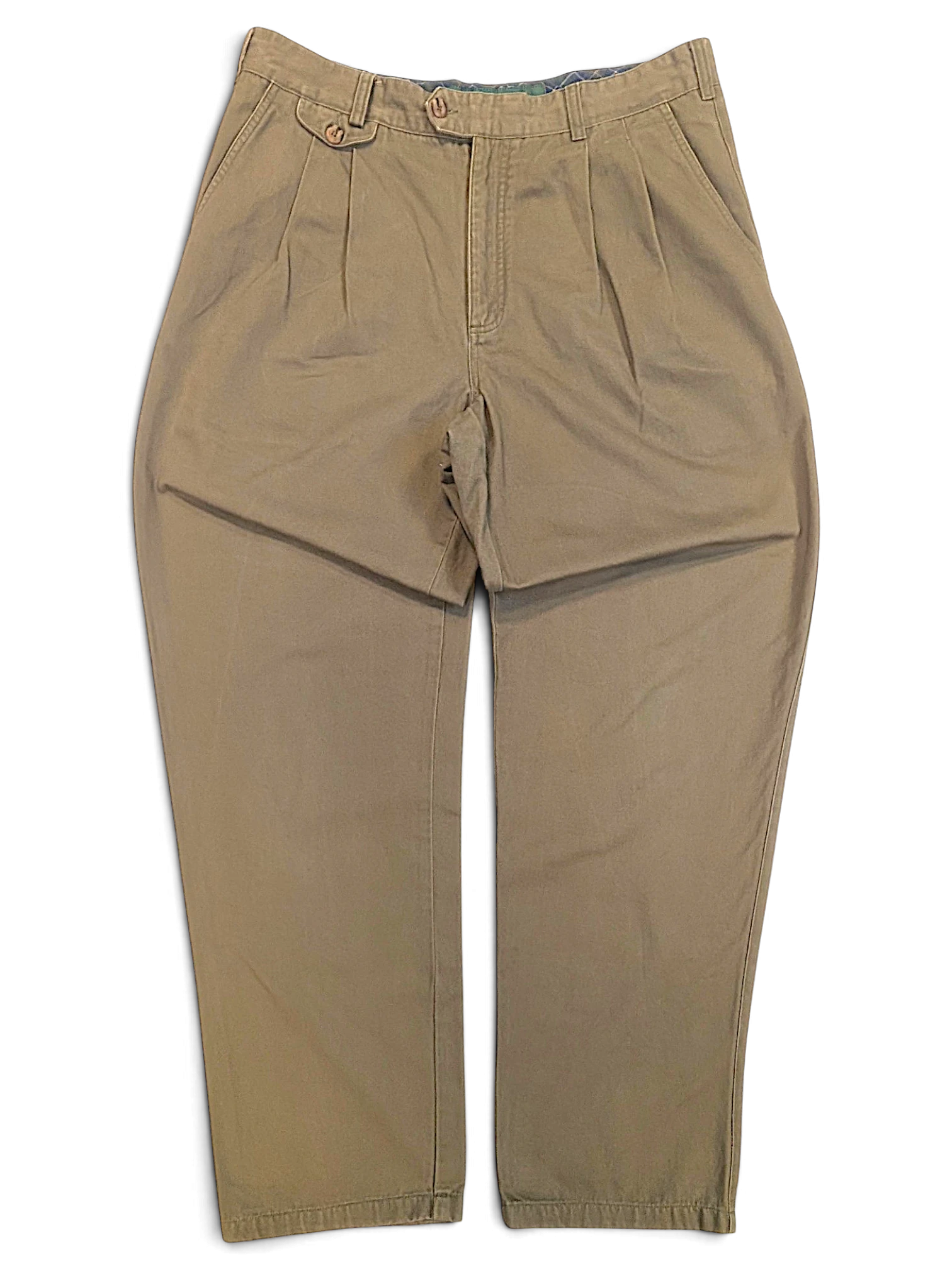 JAKE & IPI Liberty vintage olive green pleated trousers with a straight leg and button detail on the waistband.