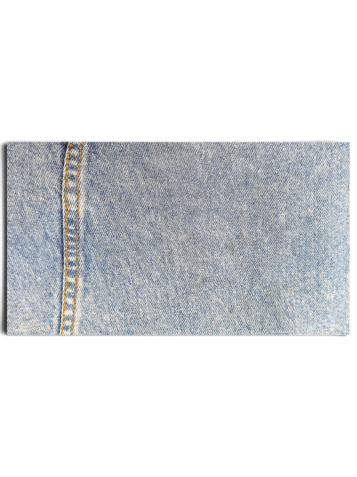 Close-up of light blue denim fabric with contrast stitching from JAKE & IPI