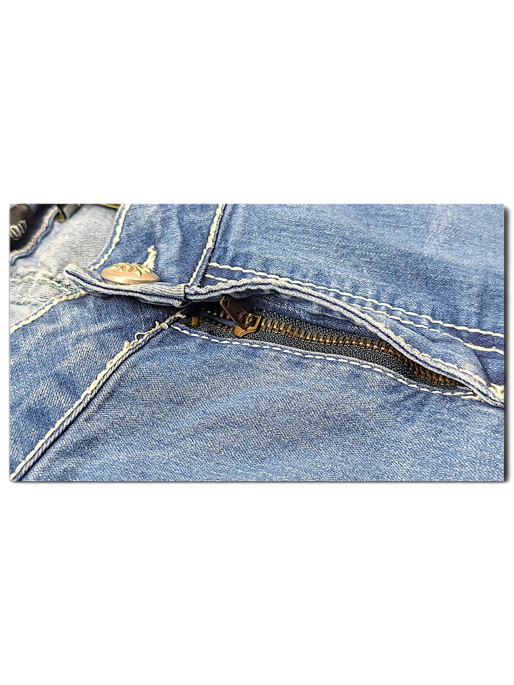 JAKE & IPI Love X Indigo Y2K jeans featuring light blue denim, contrast white stitching, and a metal zipper fly.