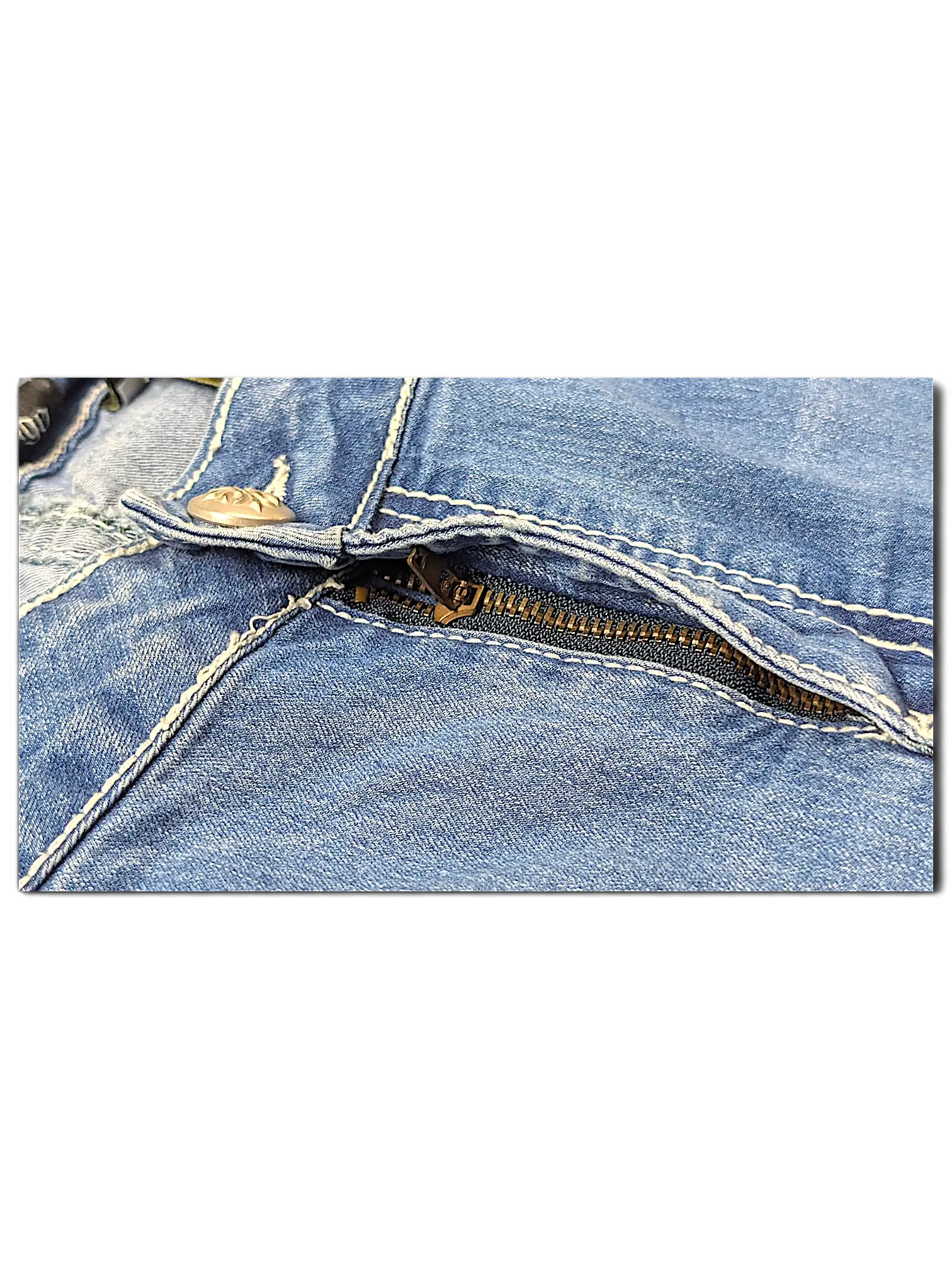 JAKE & IPI Love X Indigo Y2K jeans featuring light blue denim, contrast white stitching, and a metal zipper fly.
