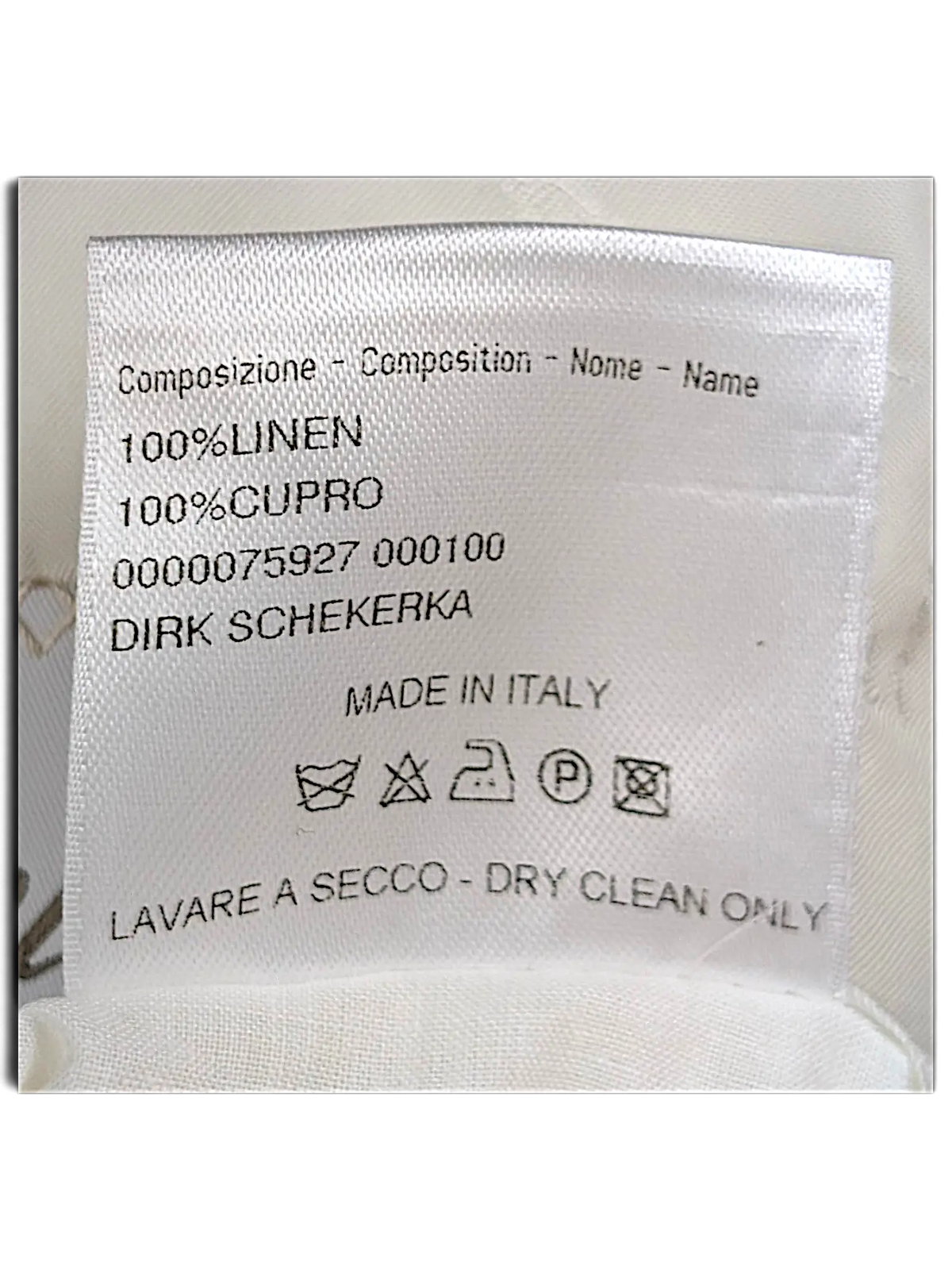 JAKE & IPI Brioni linen suit garment care label showing 100% linen and 100% cupro composition made in Italy
