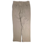 Back view of JAKE & IPI L.L.Bean beige pleated chinos featuring two buttoned back pockets on a plain background.