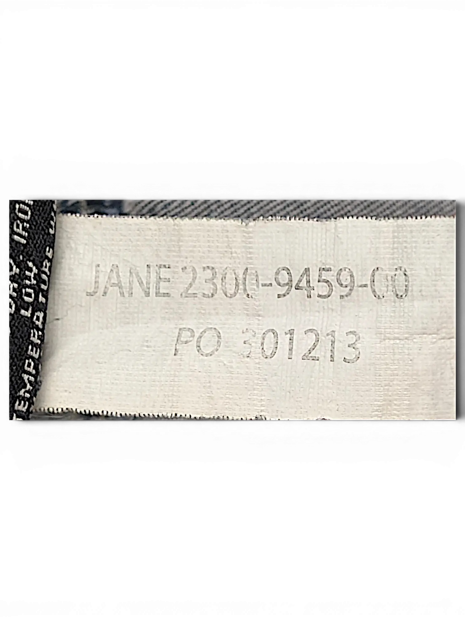 JAKE & IPI Lois Jane jeans care label with product code and washing instructions