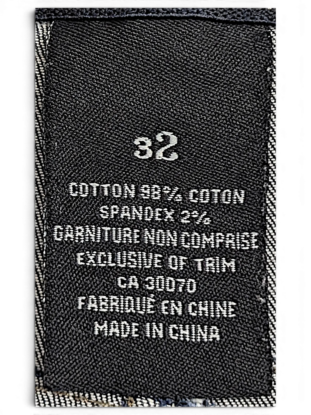 JAKE & IPI Lois Jane jeans interior label showing size 32, cotton spandex blend fabric, and comfort waist detail.