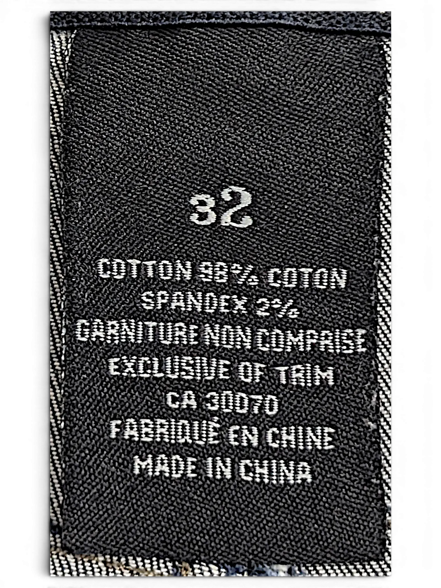 JAKE & IPI Lois Jane jeans interior label showing size 32, cotton spandex blend fabric, and comfort waist detail.