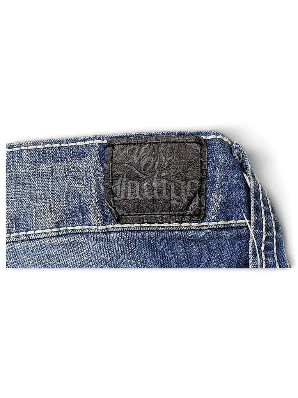 JAKE & IPI Love X Indigo blue denim jeans featuring a black leather brand patch with white contrast stitching