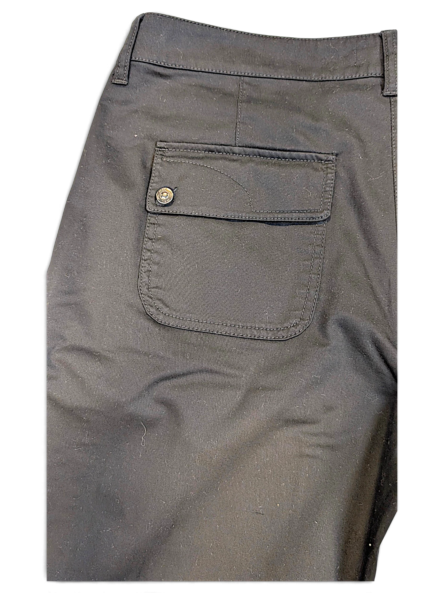 JAKE & IPI MAC Jeans black bootcut trousers featuring a rear flap pocket with a branded metal button detail.