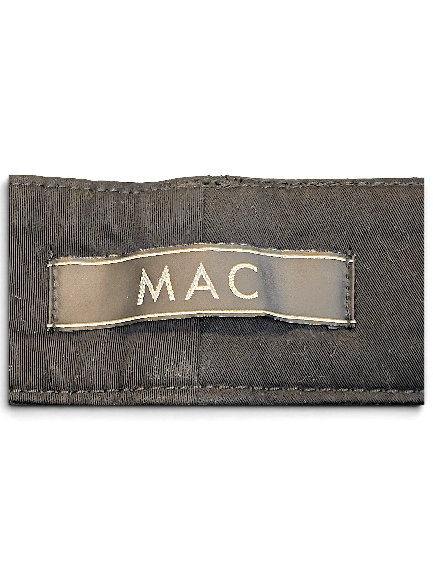 JAKE & IPI MAC Jeans black bootcut trousers clothing brand label stitched onto dark fabric
