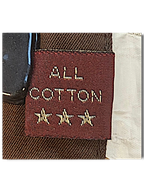 JAKE & IPI Marlboro Classics brown cotton chino label detail showing All Cotton text and three embroidered stars