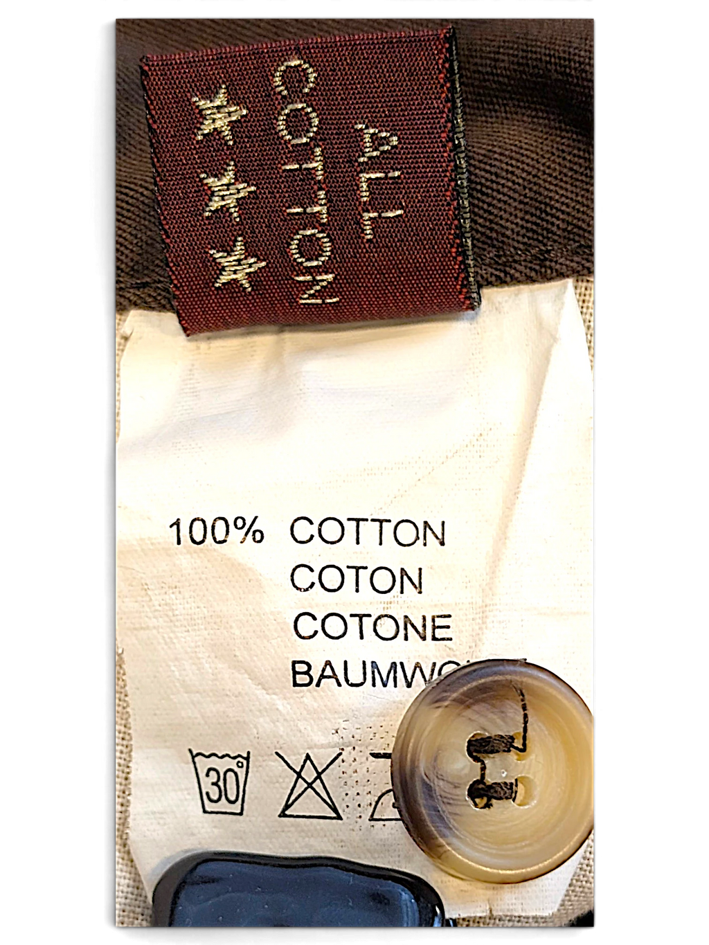 JAKE & IPI Marlboro Classics brown chino care label with 100% cotton composition and spare button