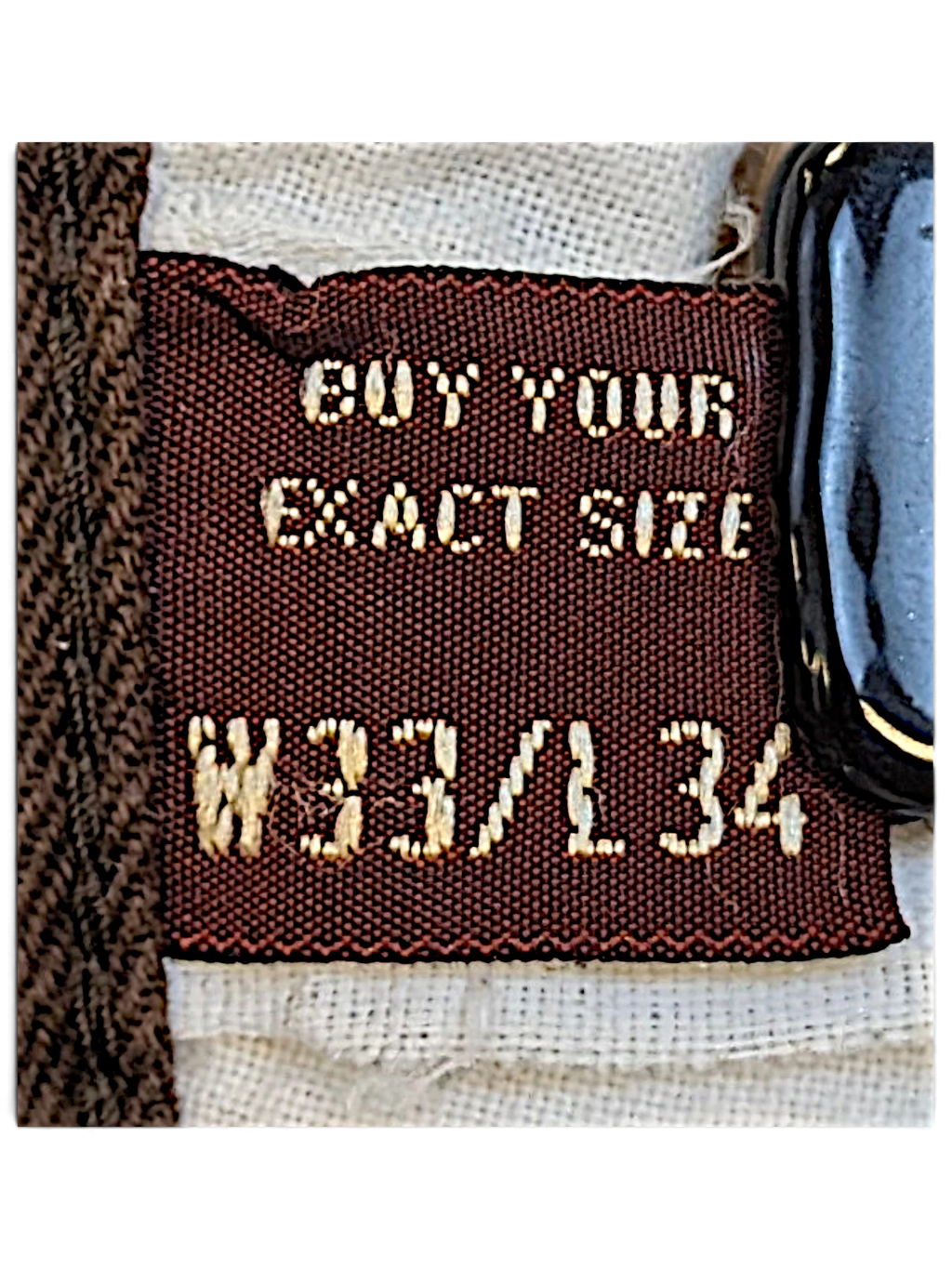 JAKE & IPI Marlboro Classics brown chino size label showing W33 L34 text on a woven fabric tag