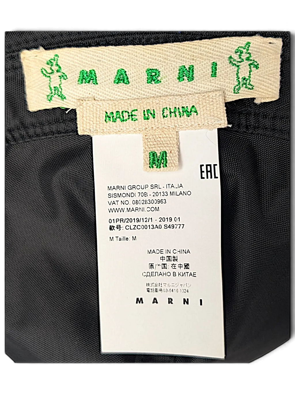 JAKE & IPI Marni bucket hat interior label showing brand logo, size M, and manufacturing details