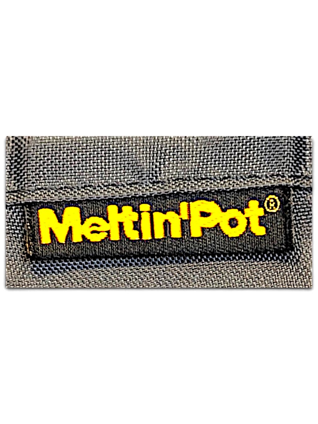 JAKE & IPI Meltin'Pot brand logo tag stitched onto dark khaki windbreaker fabric