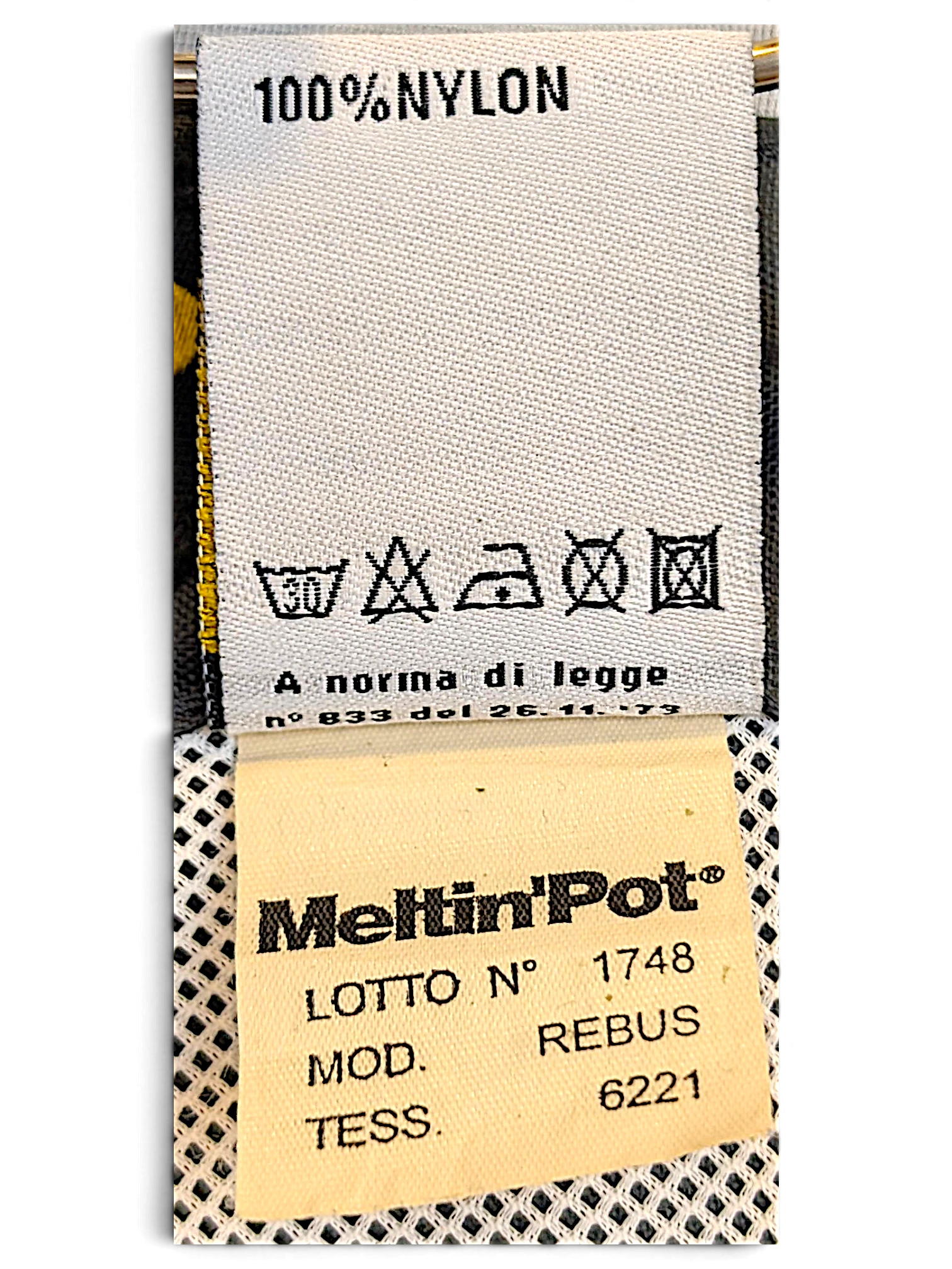 JAKE & IPI Meltin'Pot clothing care label showing 100% nylon composition and washing instructions