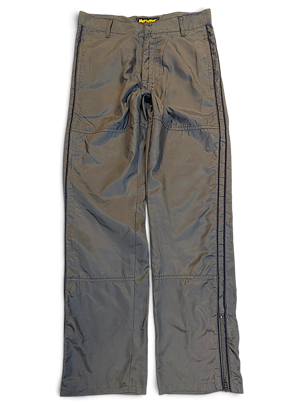 JAKE & IPI pre-owned Meltin'Pot dark khaki windbreaker pants with a relaxed fit and zip-up leg hems.