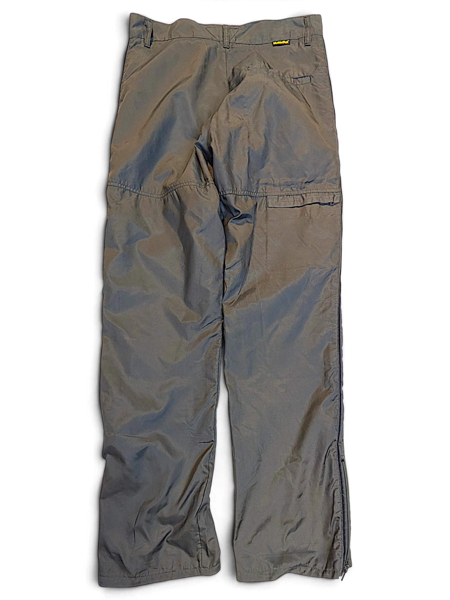 JAKE & IPI Meltin'Pot dark khaki windbreaker pants with a relaxed fit, lightweight shell, and zip-up leg hems.