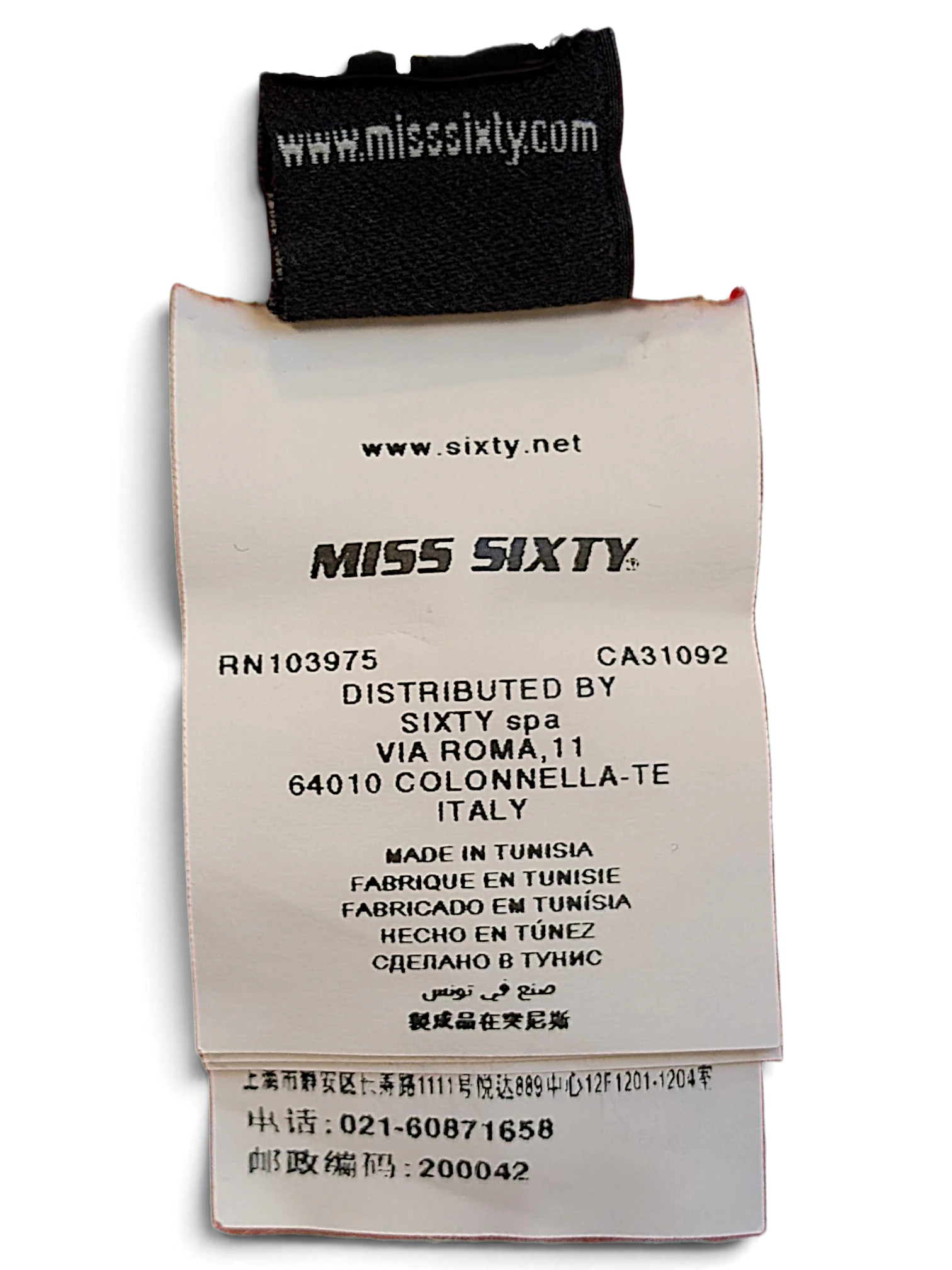 JAKE & IPI Miss Sixty clothing care label showing brand logo, origin, and distribution details on white fabric tag