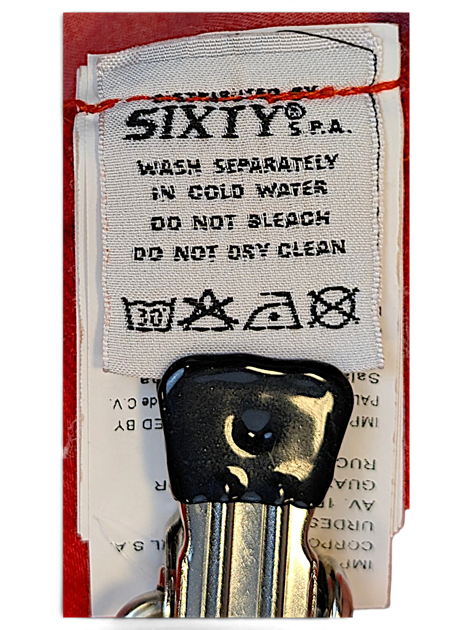 JAKE & IPI Miss Sixty Skin Deep red jeans care label with washing instructions and fabric composition details