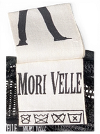 JAKE & IPI IBE Morivelle cap interior fabric care label with brand logo and washing instructions