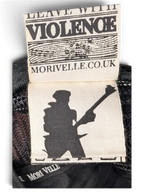 JAKE & IPI IBE Morivelle cap interior fabric label with Leave With Violence branding and musician silhouette graphic