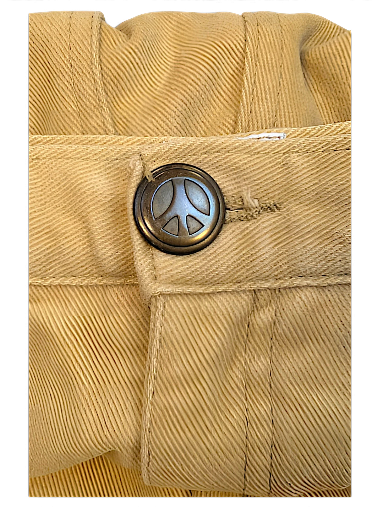JAKE & IPI pre-owned Moschino Jeans beige trousers featuring a detailed metal button with a peace sign emblem