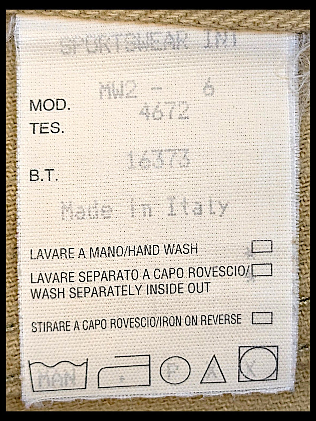 JAKE & IPI Moschino Jeans beige trousers care and origin label showing Made in Italy and washing instructions