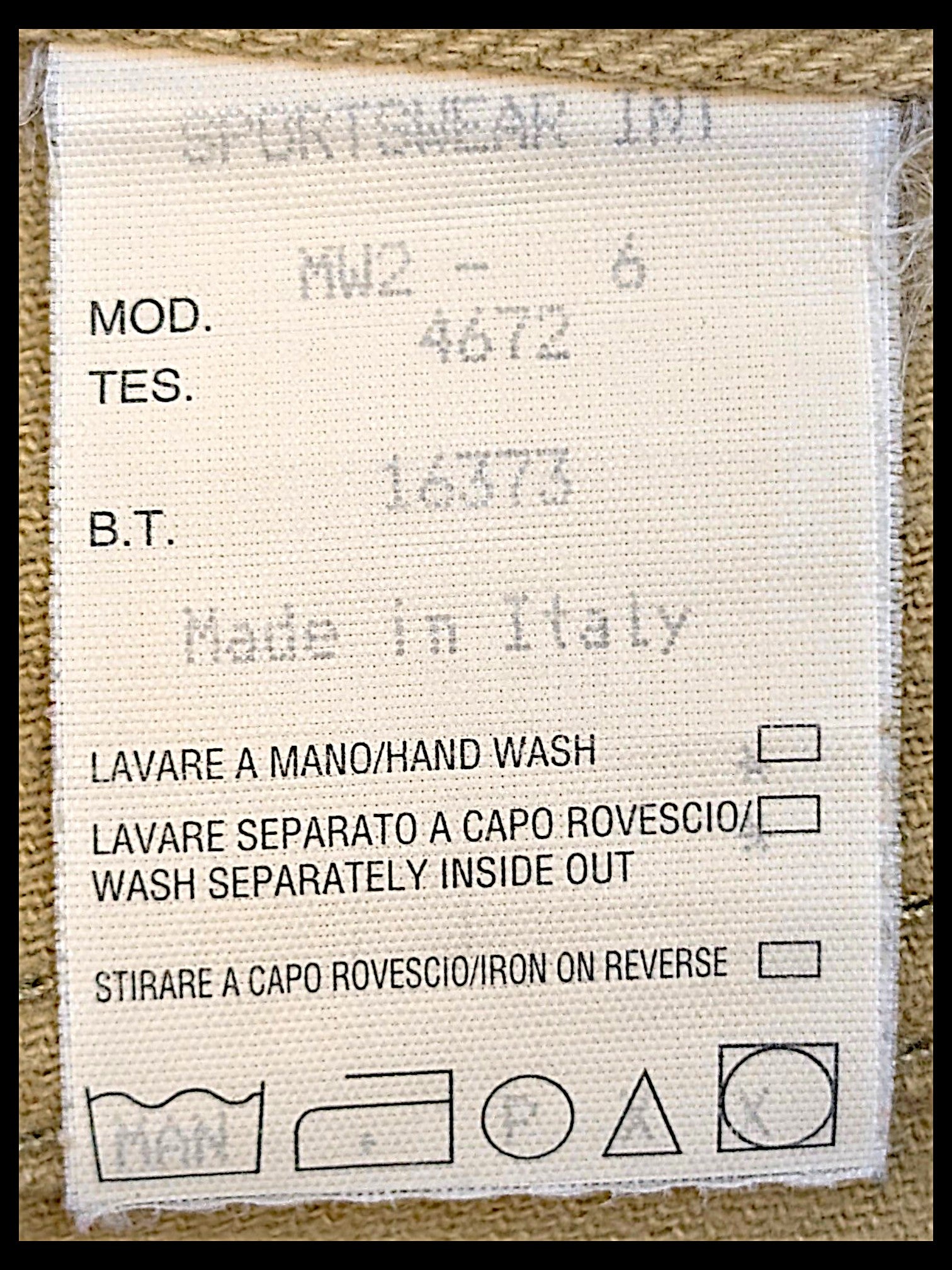 JAKE & IPI Moschino Jeans beige trousers care and origin label showing Made in Italy and washing instructions
