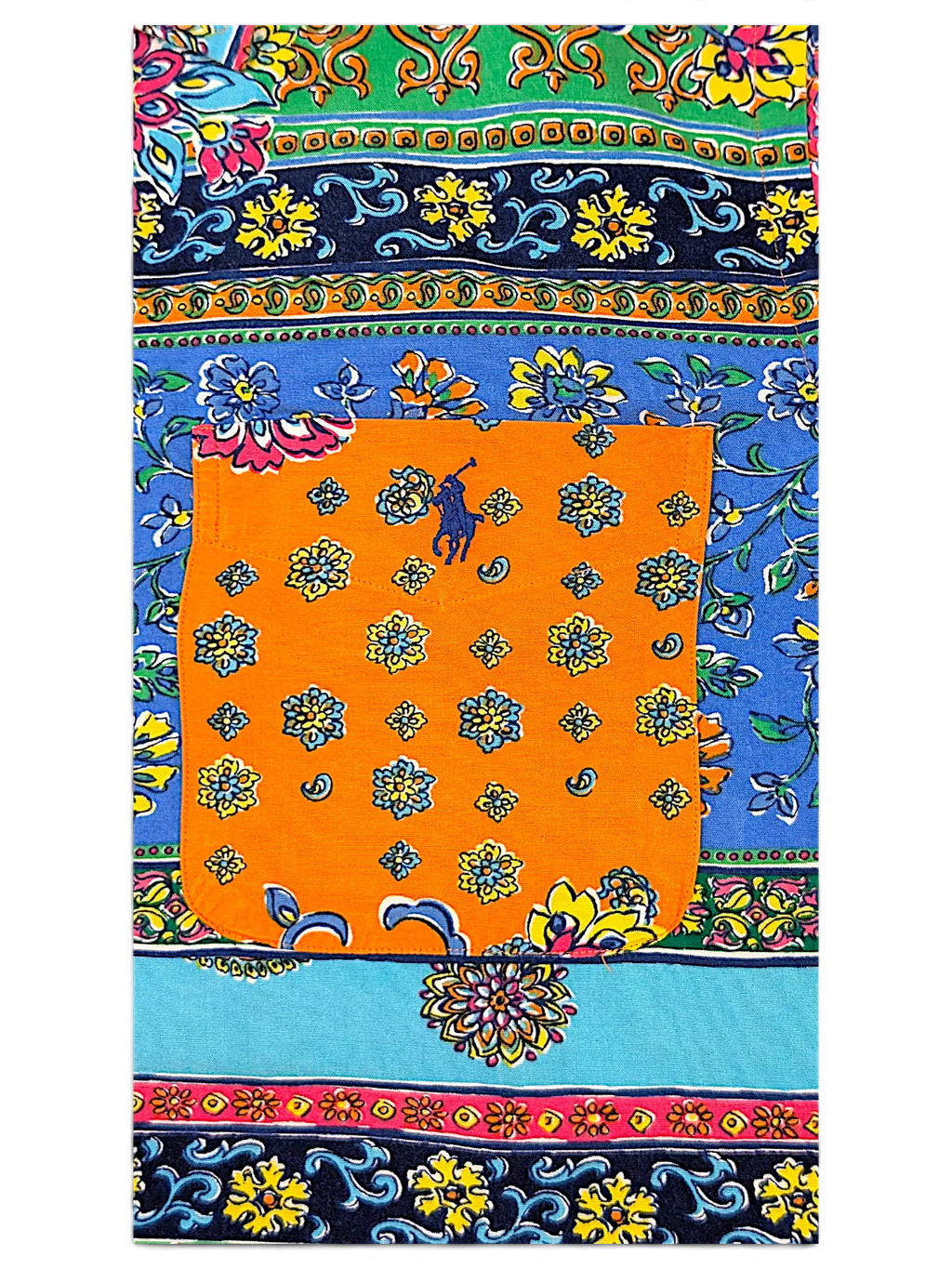 JAKE & IPI IBE polo shirt featuring a vibrant multicolor floral paisley print and a contrasting orange chest pocket.