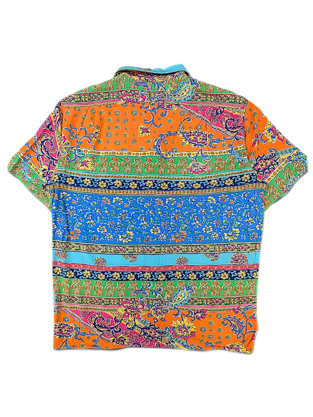 JAKE & IPI multicolor polo shirt featuring a vibrant paisley and floral pattern in orange, blue, and green tones.
