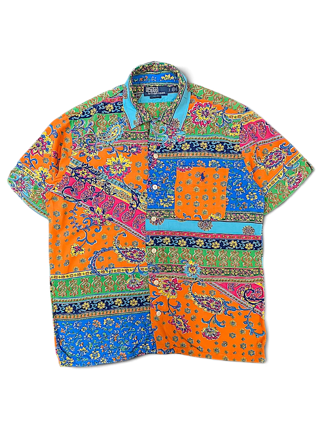 JAKE & IPI short-sleeve polo shirt featuring a vibrant multicolor paisley and floral patchwork print