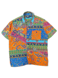 JAKE & IPI short-sleeve polo shirt featuring a vibrant multicolor paisley and floral patchwork print