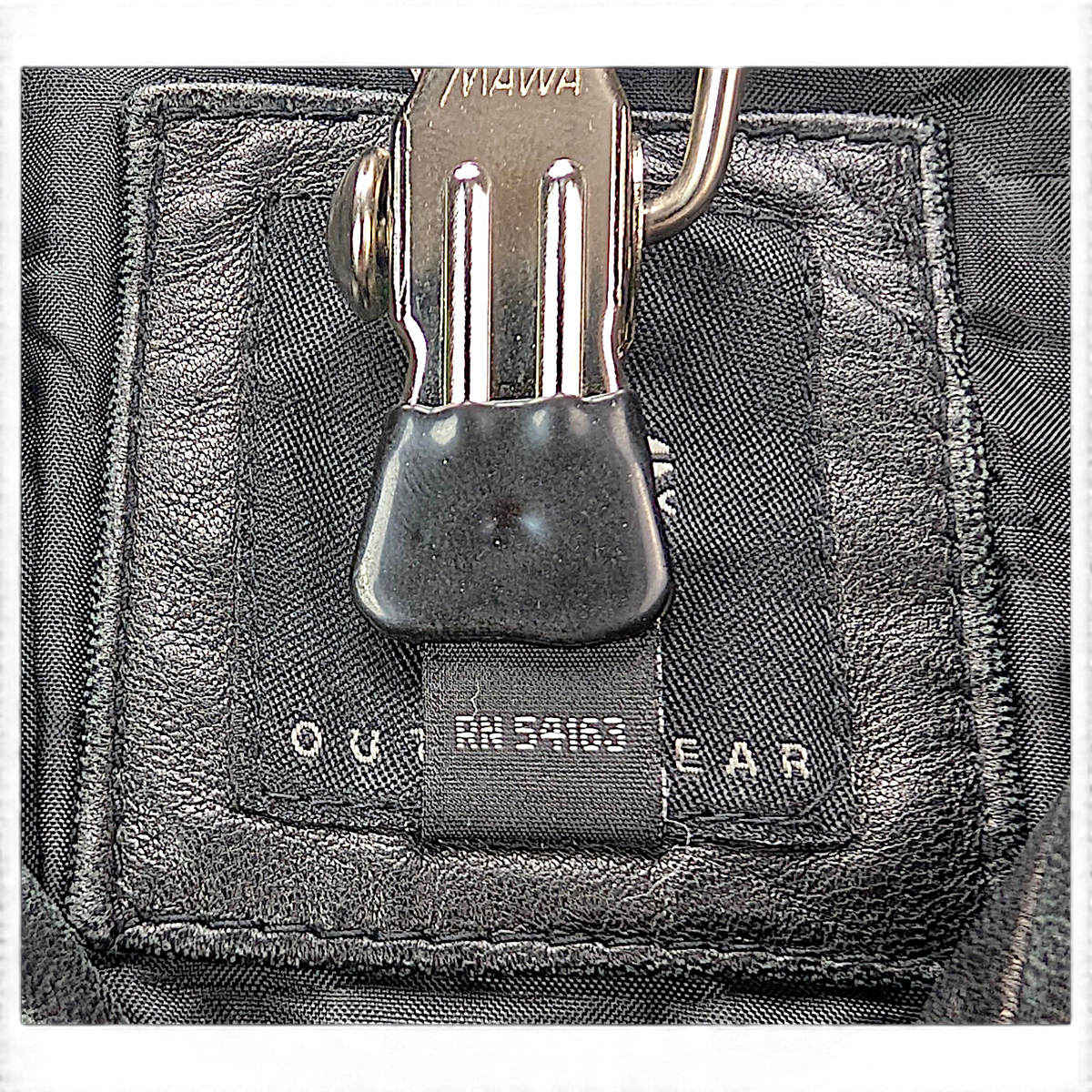 JLC New York Black Genuine Leather Zip Coat – L – fastening and hardware detail.