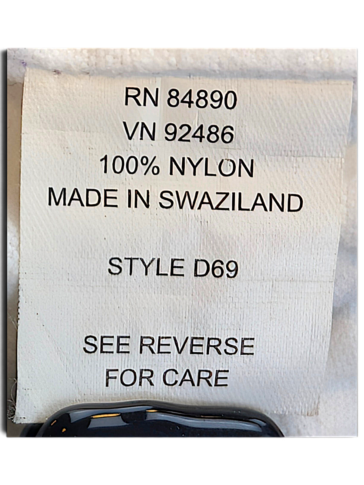 Tudor Court Lilac Snap Front Jacket; 100% nylon composition label.